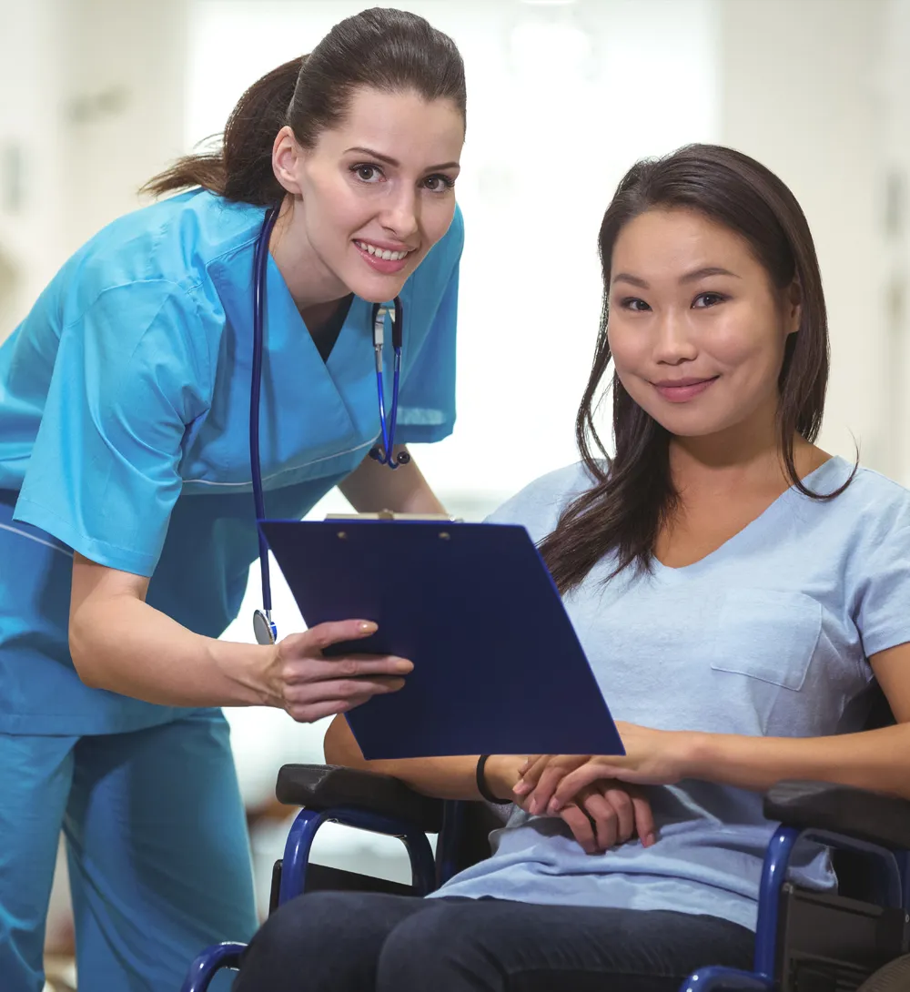 NDIS nurse explaining care plan to participant regarding funding arrangements