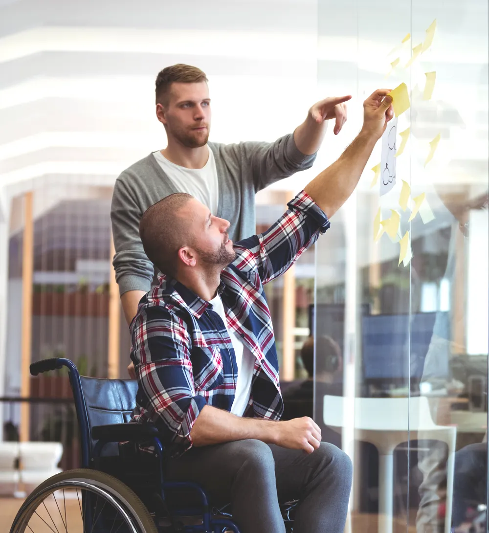 NDIS mentor teaching planning skills to participant for capacity building Gold Coast
